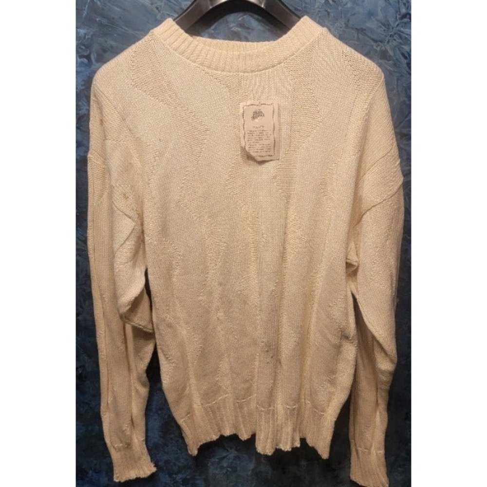 White Sears Roebuck sweater.